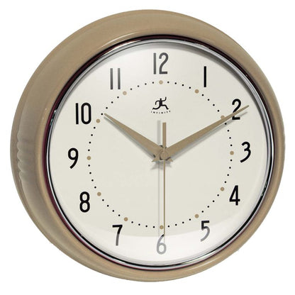 The Infinity Instrument Retro Round Latte 10940CG by Infinity features a beige finish, black numerals and tick marks, three hands, and a white face. This classic wall clock shows 2:30:10 and brings timeless style to any room.