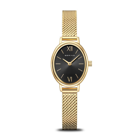 The Bering Watch - Classic Milanese Bracelet (model 11020-332) features a gold mesh band, an oval black face with gold Roman numerals and hands, and displays the Bering brand name on its minimalist dial. Its sleek Milanese bracelet adds to the elegant design.