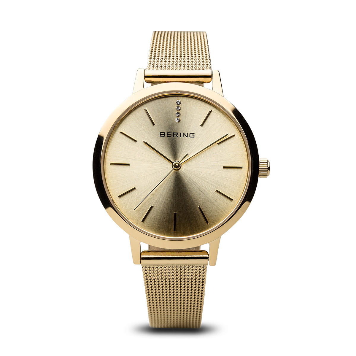 The Bering Watch - Classic Collection 13434-333 is a women's gold watch with a minimalist round face, sleek hour markers, Milanese strap, and crown on the right—elegantly designed without numerals.