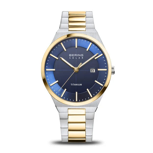 The Bering Watch - Mens Two-tone Titanium Slim Solar (14439-717) features a blue face, gold and silver hour markers, date display, and a titanium band with gold and silver links—a stylish choice for any occasion.