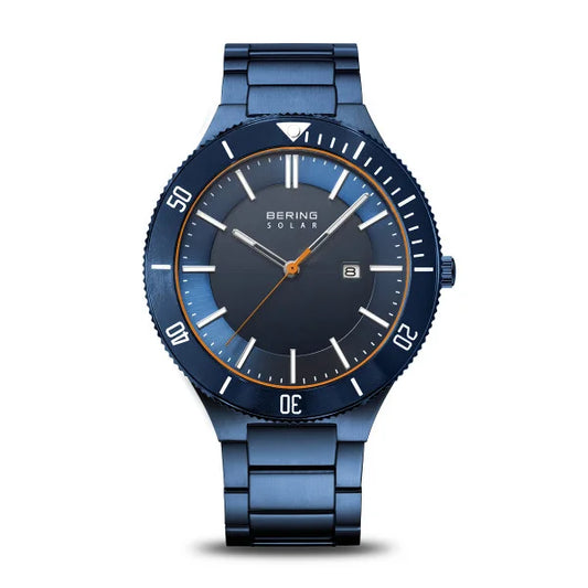 The Bering Watch - Mens Solar Blue (14443-797) by Bering features a metal band, minimalist markers, white hands with orange accents, a date display at 3 oclock, and bezel minute indicators for eco-friendly Danish style.