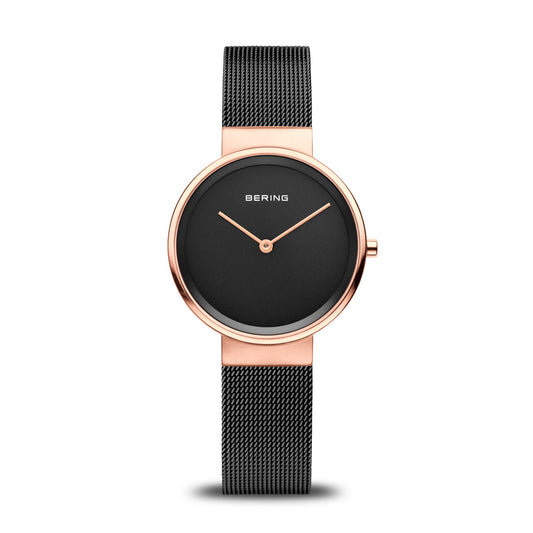 The Bering Watch - Polished/Brushed Rose Gold (14531-166) by Bering features a minimalist round case, black mesh band, black face, and simple hands without numerals or markers.