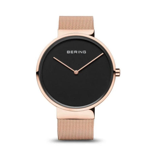 The Bering Watch - Rose Gold Classic Collection (14539-362) by Bering features a black round face, rose gold hands, and a matching rose gold mesh band against a white background.