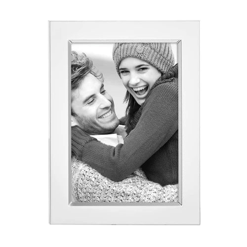 A black-and-white photo of a smiling couple in winter clothes is displayed in the Reed & Barton - Brass Frame - 1457GA.