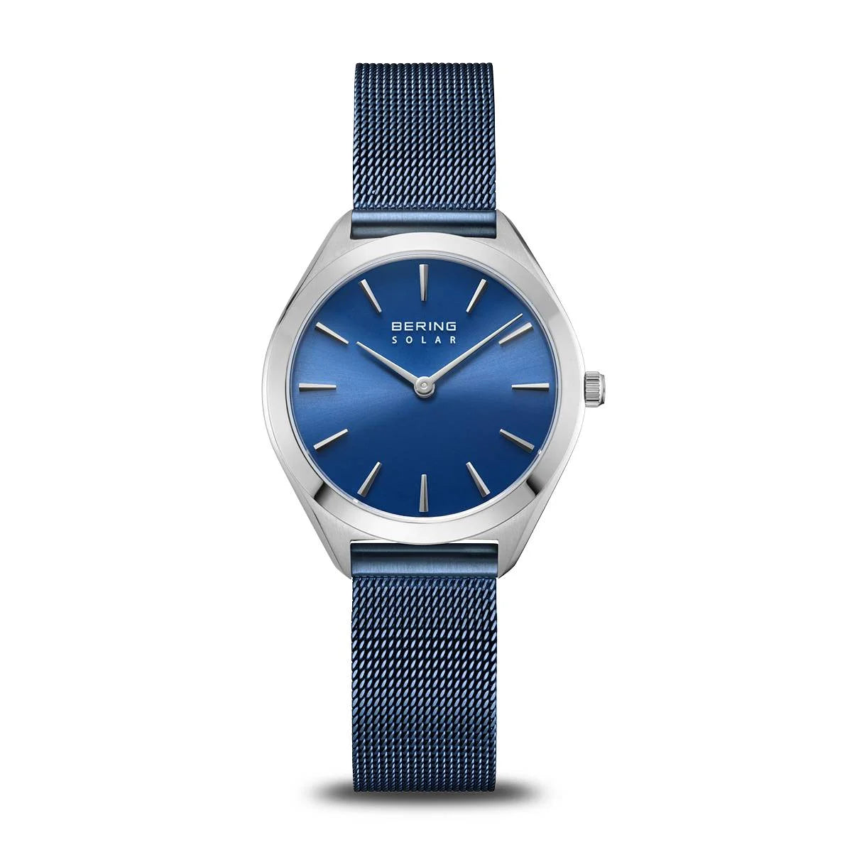 The Bering Watch - Arctic Blue Solar (17331-307) features a blue Milanese strap, blue dial, silver casing, and hands. "BERING SOLAR" is displayed below 12 o'clock, making it a refined solar ladies watch by Bering.