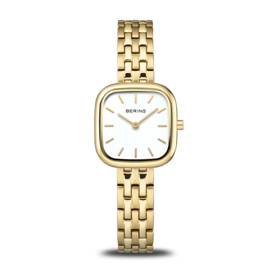 The Bering Watch - Brushed Gold - 17926-734 is a minimalist ladies watch with a rectangular white face, gold hour markers, and a gold metal link band from Bering, shown elegantly against a white background.