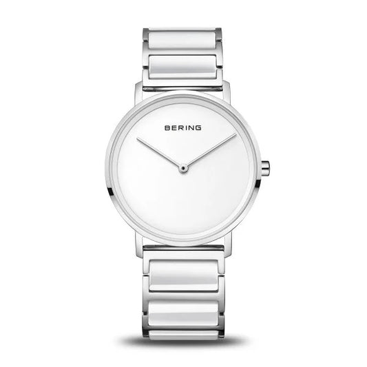 The Bering Watch - Slim Womens White Ceramic (18535-754) by Bering features a minimalist silver design, white dial without hour markers, and metal link band, displayed against a plain white background.