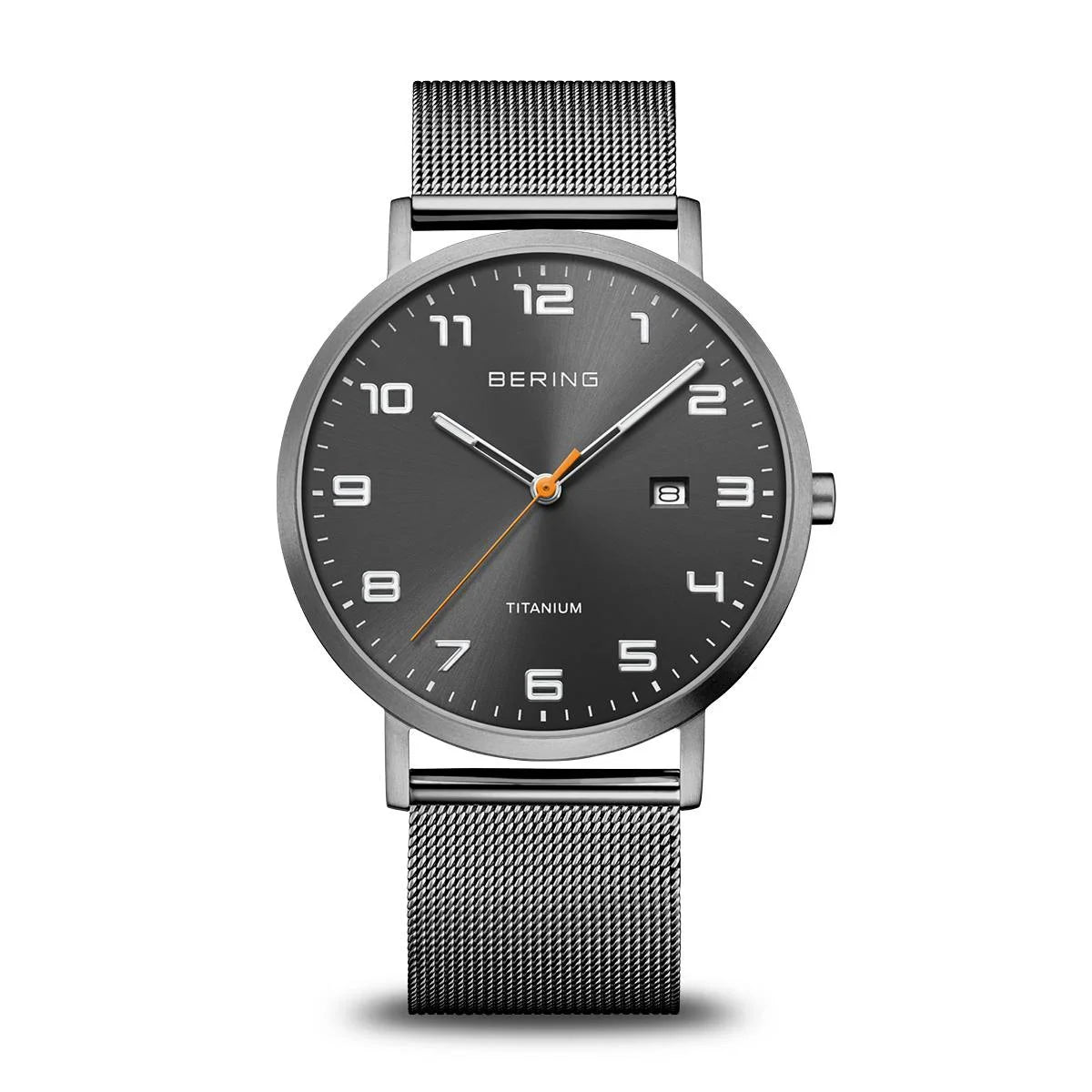 Introducing the Bering Watch - Titanium Collection - 18640-377: a minimalist timepiece by Bering, featuring a sleek black face with white numerals and a date window. Its distinctive silver mesh band is paired with an orange minute hand and white hour and second hands. Crafted with scratch-resistant sapphire crystal, this watch offers enduring elegance and durability.