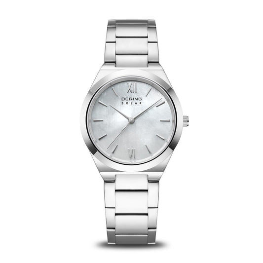The Bering Watch - Solar Collection 19932-700 features a silver stainless steel band, minimalist white dial with Roman numerals at 12, 3, 6, and 9, and “Bering” plus “Solar” printed on the face.