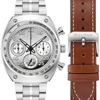 The Bulova Watch - SHELBY® Racer Chronograph - 96K118, featuring three subdials and a tachymeter, is shown alongside a brown leather strap with a silver Bulova buckle.