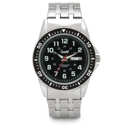 The Speidel Diver Watch (60330700) features a silver-tone case, black face with white numerals, metal band, quartz movement, and displays time, day ("SAT"), and date ("12") in a right-side window.