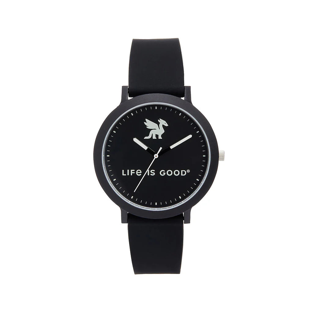 The Speidel Watch - Life is Good - Dragon (60930010) features a simple round face, black silicone strap, silver accents, a dragon at the top, LIFE IS GOOD® in white text, and matching white watch hands and hour marks.