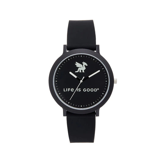 The Speidel Watch - Life is Good - Dragon (60930010) features a simple round face, black silicone strap, silver accents, a dragon at the top, LIFE IS GOOD® in white text, and matching white watch hands and hour marks.