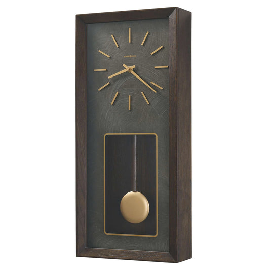 The Howard Miller Tegan 625-779 is a rectangular wall clock with a dark wood frame, gold hands, hour markers, and pendulum. This modern, elegant Howard Miller clock brings timeless style to any room.