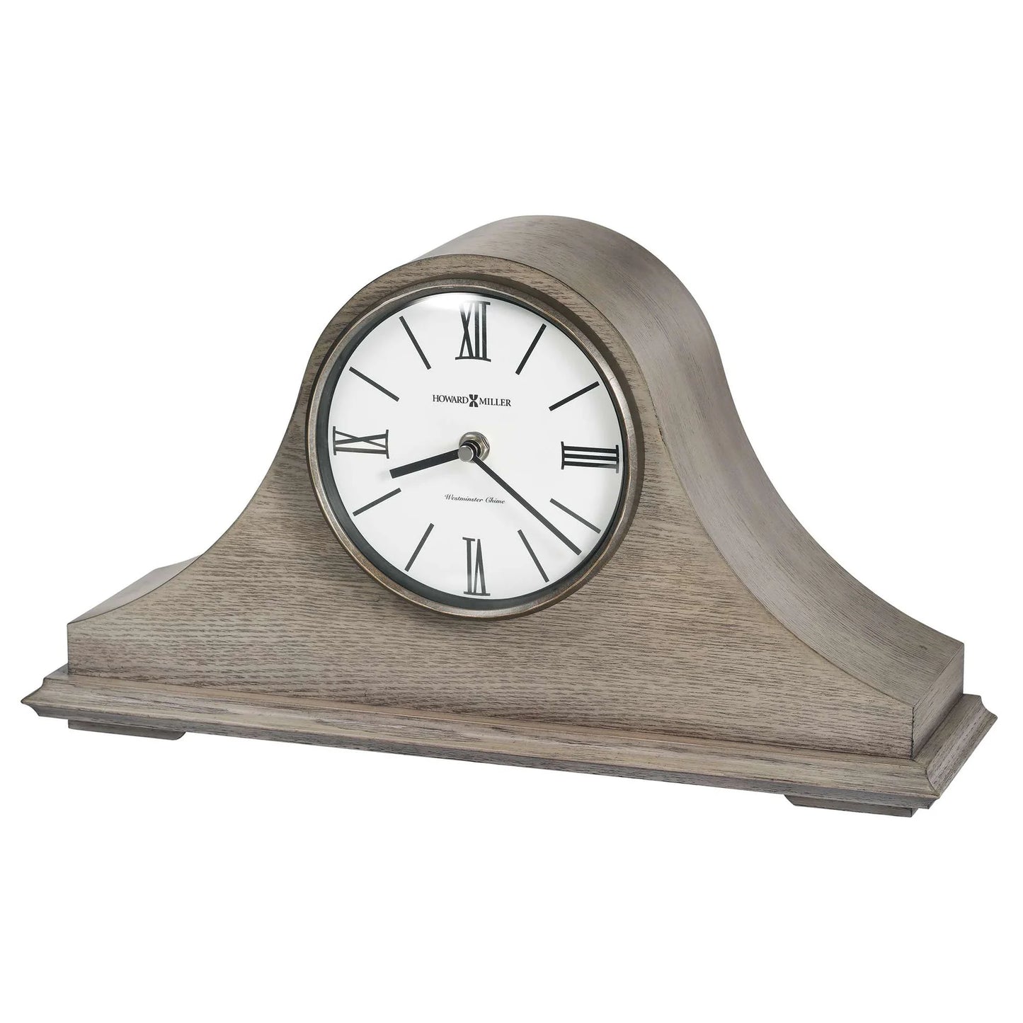 The Howard Miller Lakeside Mantel Clock (635-223) features a wooden case with a curved top, a white face, black Roman numerals, and hands—offering classic style that makes it a timeless addition to any room.