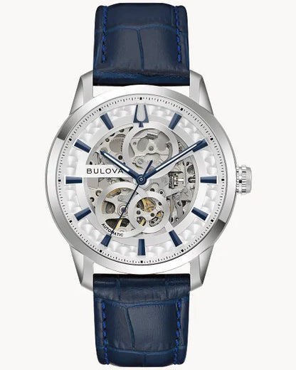 The Bulova Watch - Classic Collection - 96A330 is a men’s timepiece with a blue leather strap, skeleton dial revealing its mechanical movement, blue hour markers, and a sapphire crystal face.