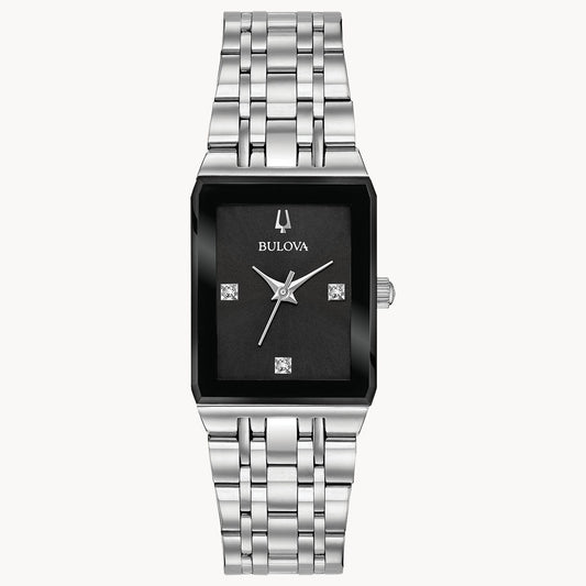 The Bulova Quadra 96P202 is a modern women’s watch with a silver metal link bracelet, rectangular black dial, diamond markers at 3, 6, 9, and 12 o’clock, and sleek silver hands—a blend of elegance and style.