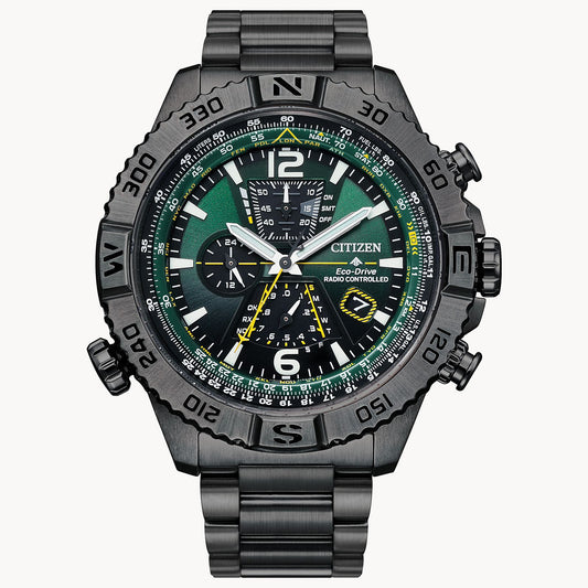 The Citizen Promaster Navihawk AT8227-56X is a black stainless steel Eco-Drive pilot watch with a green and black dial, multiple subdials, white and yellow accents, and a compass-marked rotating bezel.