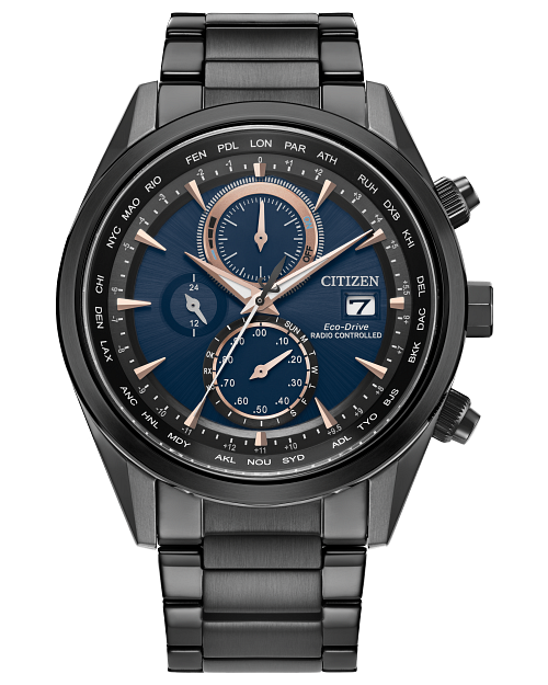 The Citizen AT8265-57L Atomic Sport Luxury men’s Eco-Drive watch features a black metal band, blue dial, rose gold accents, three subdials, date window at 3 o’clock, and city abbreviations for precise radio-controlled time.