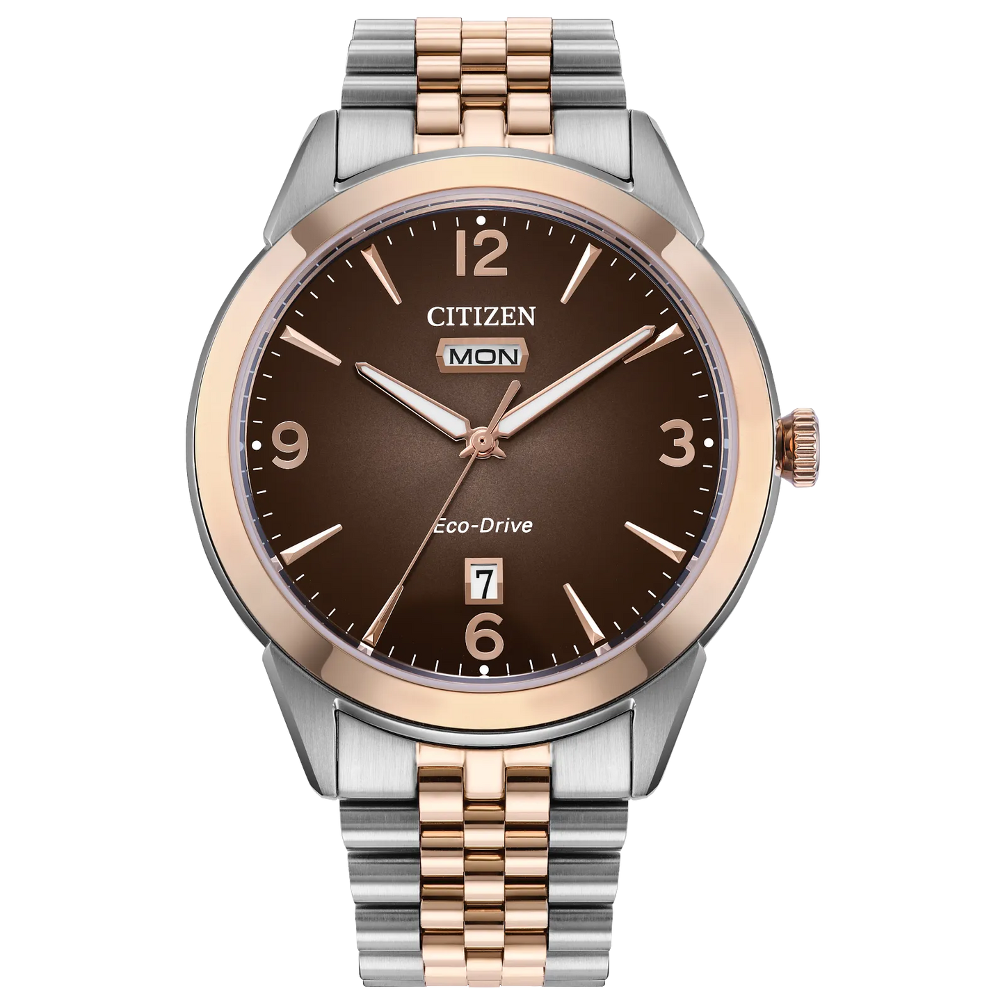 The Citizen Watch - Rolan (AW0156-57X) features a brown dial, rose gold-tone bezel, silver and rose gold-tone metal link band, and displays day/date above 6 o’clock. Powered sustainably by Eco-Drive technology.