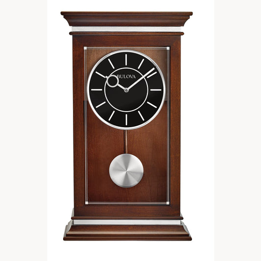 The Bulova Clock - Westport (B1850) is a solid hardwood wall clock with a rectangular frame, black face, white markers and hands, visible silver pendulum, branded Bulova, featuring Harmonic II PLUS quartz chiming for elegant timekeeping.