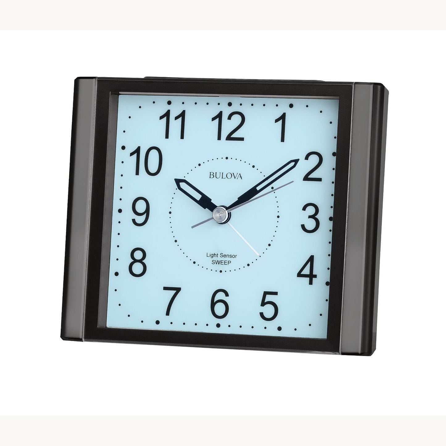 The Bulova Clock - EZ View - B1872 is a square black clock with a light blue face, black numbers, and three hands showing 1:10:08. It features “Light Sensor SWEEP,” silent sweep quartz movement, and modern design for quiet operation.