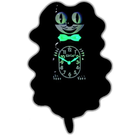 The California Clocks Kit-Cat Klock - Classic Black Gentleman Glow Edition (BC-1 GLOW) features a charming black cat-shaped design with glowing green eyes, bow tie, clock hands, and numbers set against a dark background. Its tail hangs down gracefully as a pendulum.