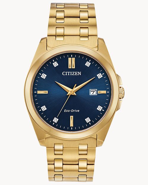 The Citizen Peyten BM7103-51L features a gold-tone stainless steel case, blue dial, sapphire crystal, gold hour markers, date at 3 o’clock, diamond-like accents, and a metal link bracelet for an elegant finish.