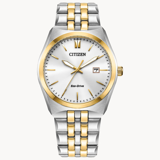 The Citizen Corso BM7334-58B men’s Eco-Drive watch features a white dial, gold markers, date at 3 o’clock, and a stainless steel bracelet with silver and gold-tone accents.