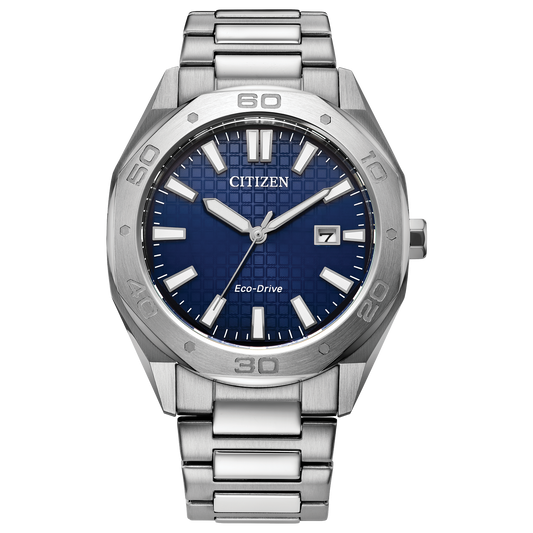 The Citizen Watch - Odyn Weekender Sport (BM7630-80L) features a blue textured dial, silver hour markers and hands, date window at 3 o’clock, and a stainless steel link band.