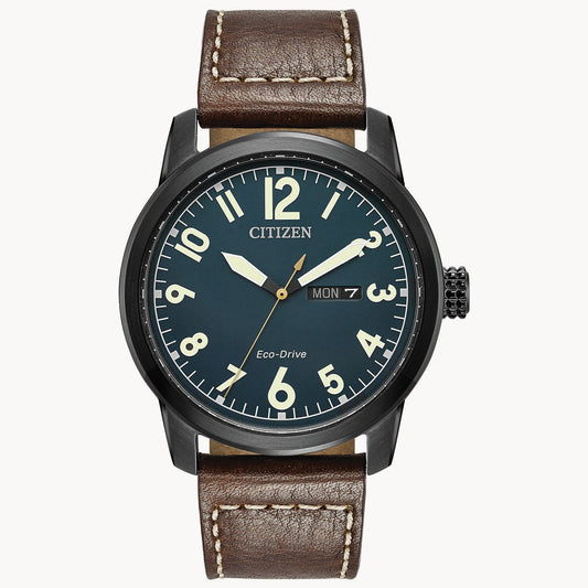 The Citizen Watch - Chandler - BM8478-01L features a black round dial with white numerals, brown leather strap, day-date display, luminous hands, and military-inspired design. "Citizen" branding sits just below the 12 o’clock mark.