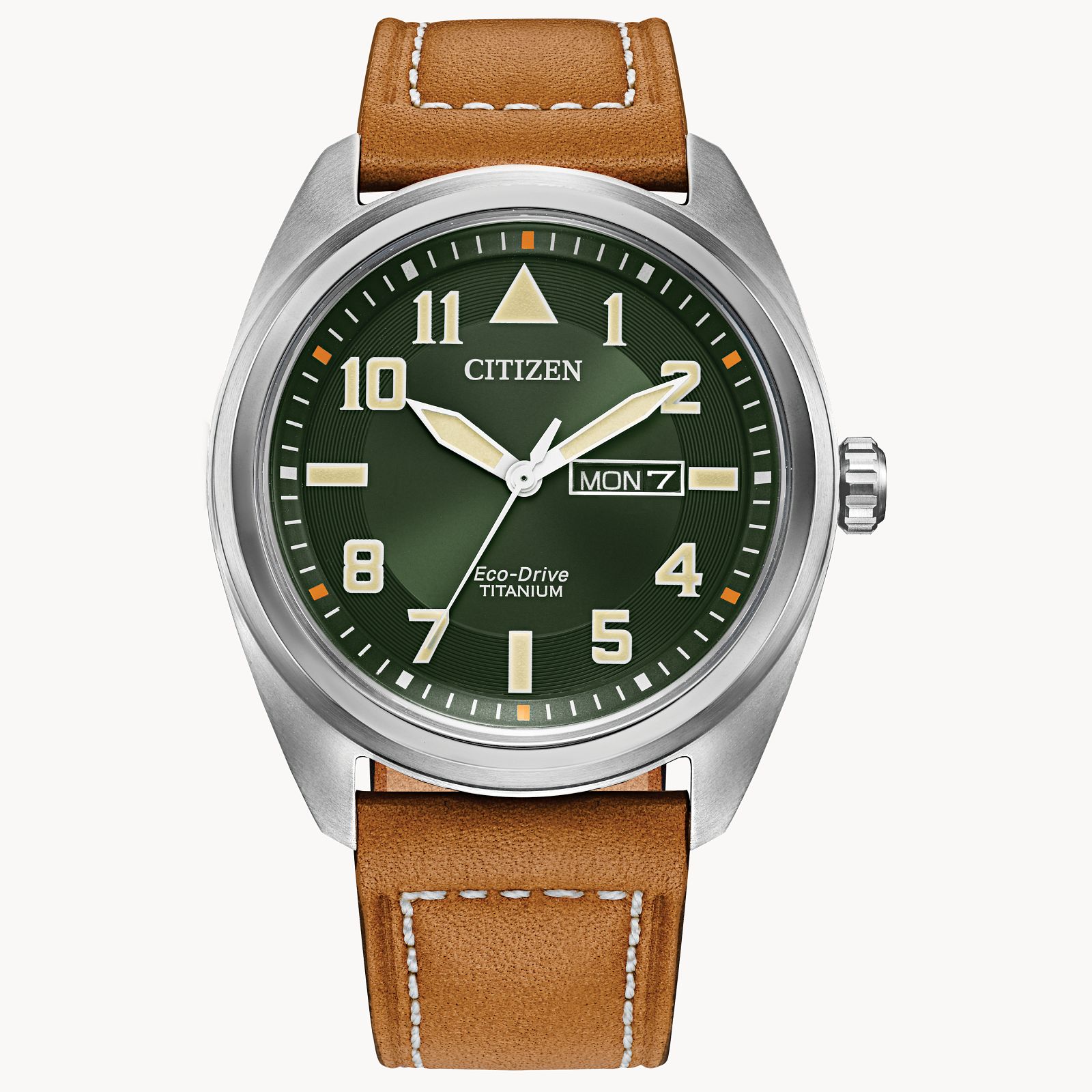 The Citizen Garrison Super Titanium (BM8560-02X) watch by Citizen features a green dial, luminous hands and markers, day-date display at 3 o’clock, and a brown leather strap with white stitching.