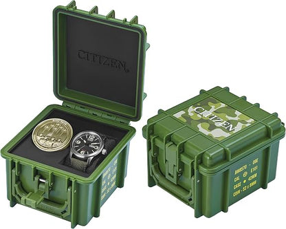 Two green, military-style cases—one open to display the Citizen Watch - Military Commemorative Box Set - BM8570-09E and a coin, the other closed with camouflage and bold Citizen branding on its lid.