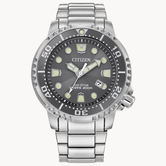 The Citizen Promaster Dive BN0167-50H features a silver metal band, round black dial with luminous markers, date at 4 oclock, marked bezel, and 200m water resistance—perfect for underwater adventures.