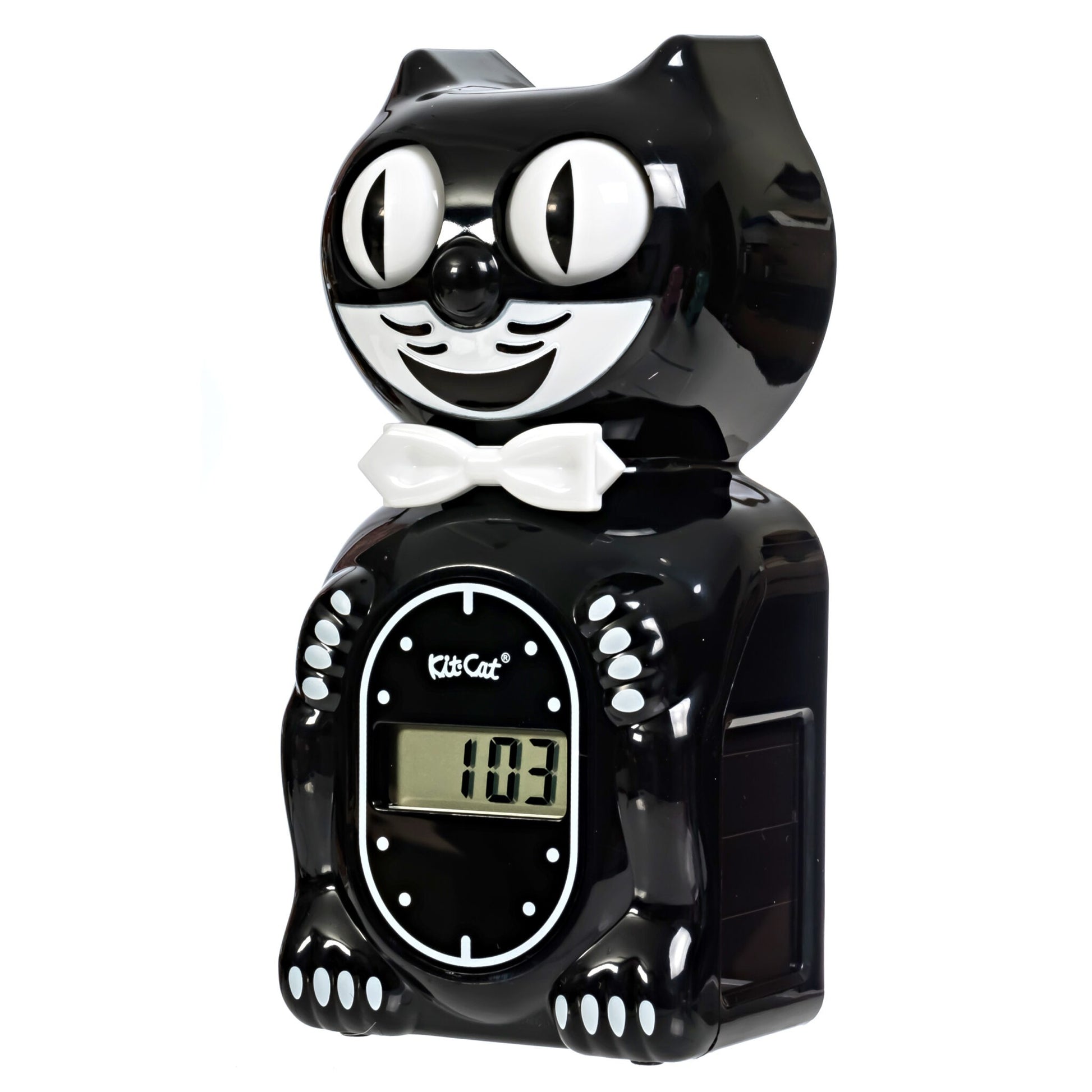 The Kit-Cat Klock - Black Solar Digital Alarm Clock (SKC-1) by California Clocks features retro cat design, moving eyes, a white bow tie, and a digital display on its belly—perfect for adding vintage charm to any room.