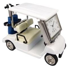 A Sanis Enterprises Sanis Mini Clock Golf Cart (C3570WH) in white, featuring beige seats, a blue golf bag at the rear, and a mini clock face on the front where the windshield is.