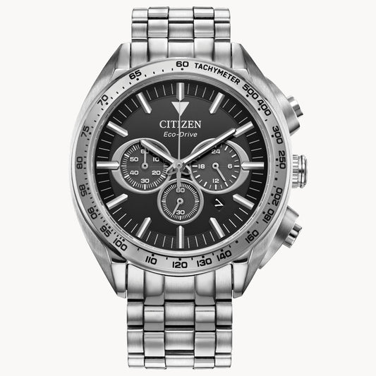 The Citizen Watch - Carson (CA4540-54E) by Citizen showcases a silver stainless steel bracelet and a black dial with multiple sub-dials, elegantly set against a white background.