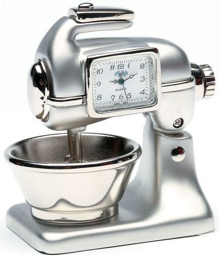 The Sanis Enterprises Mini Clocks - Silver Mixer and Bowl Clock (CK135) features a mixing bowl base, rectangular clock face, and clear hands—perfect for fans of quirky mini clocks.