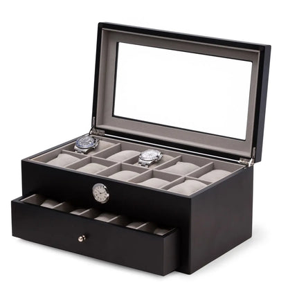 The Bey-berk Watch Box - Black 20 Watch Box with Clock (CM640BLK) features a glass lid, lower drawer, built-in clock on the front, and cushioned slots to display up to 20 watches. Two wristwatches are shown inside for display.