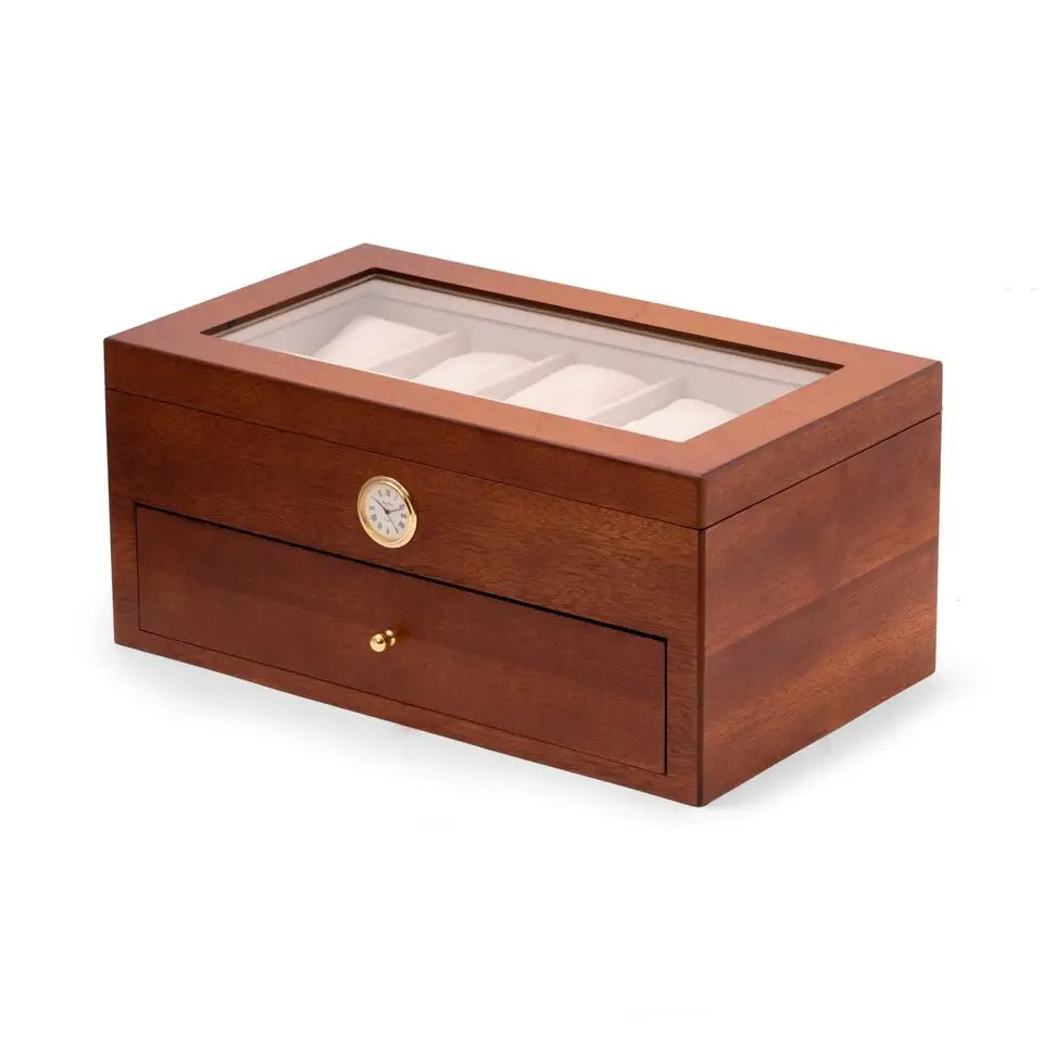 The Bey-berk CM640BRW Watch Box features a polished cherry wood finish, glass top, built-in clock on the front, pull-out drawer below, and 20 spacious compartments visible through the transparent lid.