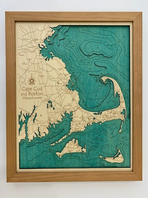 The Lake Art Lake Map - Cape Cod and Boston (14" x 18") is a laser-carved wooden relief map featuring etched land, blue-green water contours, and detailed labels—an eye-catching Massachusetts piece for any room.