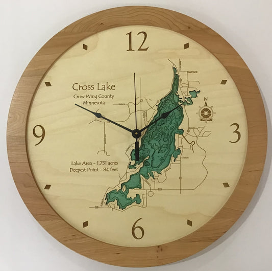 The Lake Art Lake Clock - Cross Lake is a custom wooden wall clock featuring a map of Cross Lake, Minnesota, with contours, compass rose, lake facts (1,751 acres area, 84 ft deep), and displays the time at 9:14.