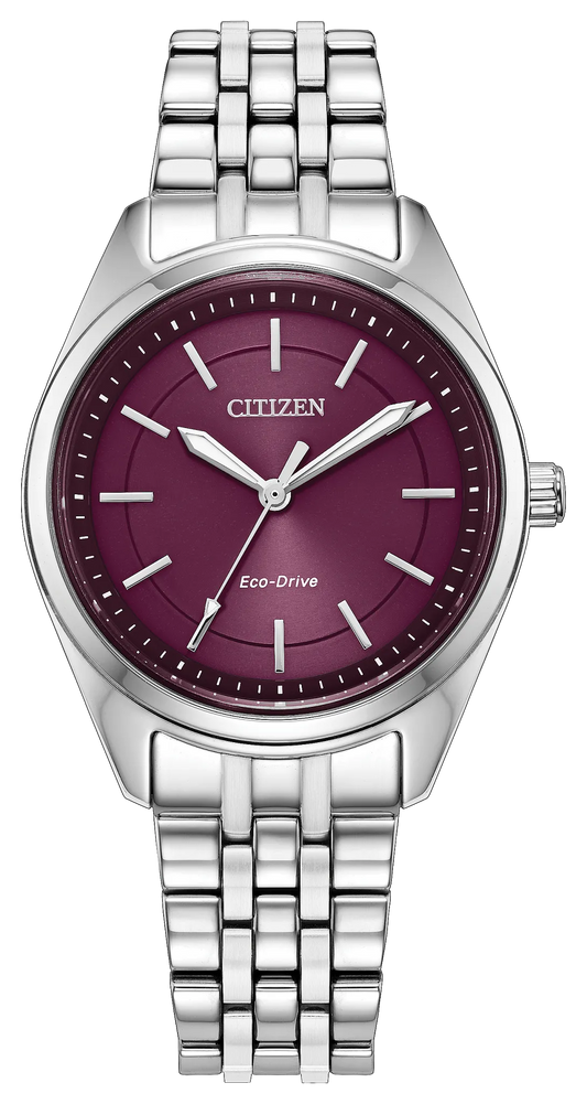 The Citizen Watch - Ladies’ Peyton - EM1230-54X by Citizen features a sleek silver-tone design with a metallic band and a striking deep purple dial adorned with silver hour markers and hands, making this sustainable Eco-Drive women’s watch an elegant fusion of style and eco-friendly innovation.