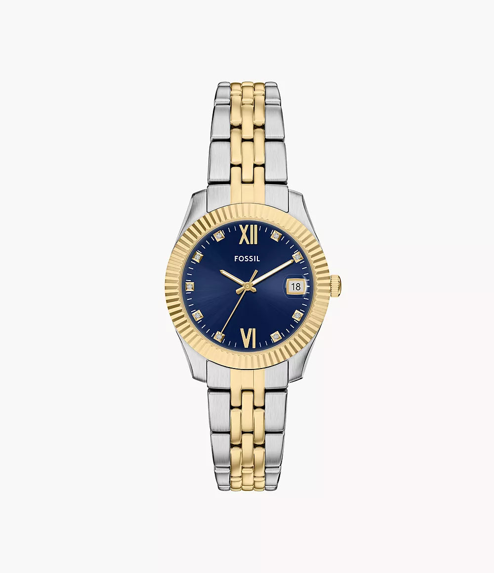 The Fossil Watch - Scarlette - ES5443 features a two-tone stainless steel band, blue dial with gold Roman numerals at 12 and 6, crystal hour markers, and a date window at 3 o’clock.