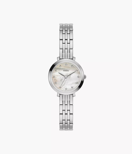 The Fossil Watch - Heidi - ES5499 by Fossil features a silver tone finish, a round white mother-of-pearl dial with silver hour markers, and a slim linked metal band, elegantly displayed against a plain white background.
