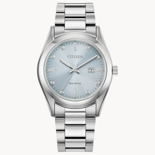 The Citizen Watch - Sport Luxury - EW2700-54L features a silver stainless steel bracelet, light blue face, silver hour markers, date window at 3 o'clock, and a minimalist, elegant design.