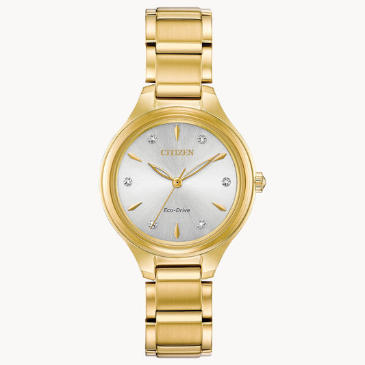 The Citizen Corso FE2102-55A is a gold-tone stainless steel Eco-Drive watch featuring a silver face, gold hands and markers, six diamond accents, and a metal link band for a sleek, elegant look.