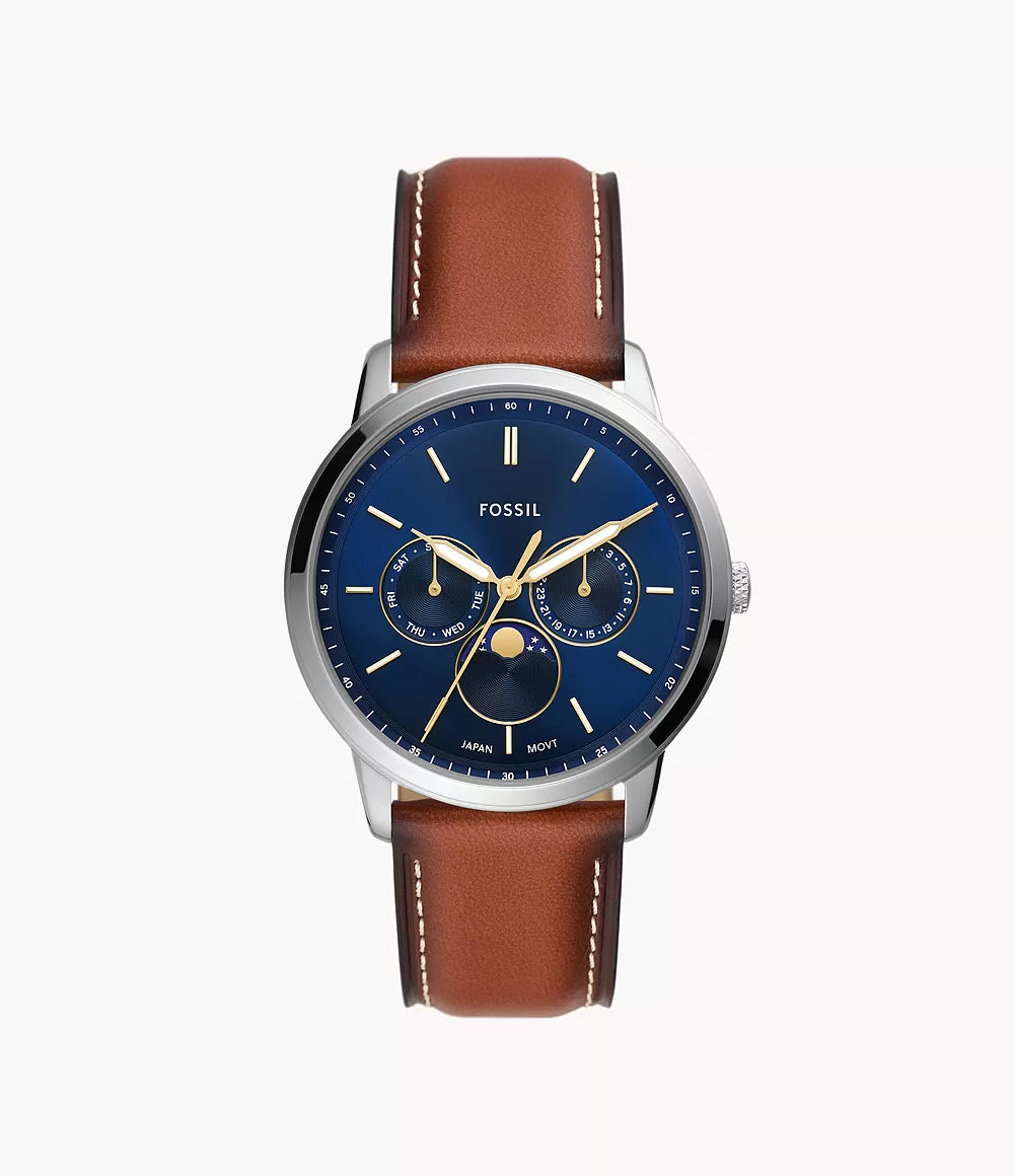 The Fossil Watch - Neutra Moonphase - FS5903 by Fossil features a brown leather strap, silver case, blue dial with gold hands and subdials, moon phase indicator, plus month and date functions.