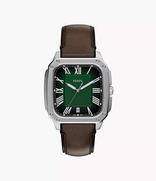 The Fossil Watch - Crosby - FS6150 features a square silver case, green dial with white Roman numerals, date window at 6 o'clock, and a brown leather strap for a stylish, refined look.