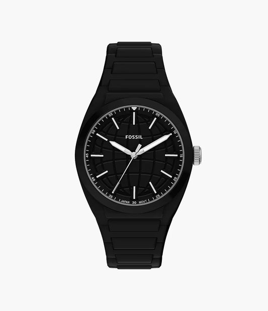 A black Fossil Watch - Everett Silicone - FS6175 with a black round dial, silver hands, white hour markers, and a matching black silicone band from Fossil, displayed on a plain white background.